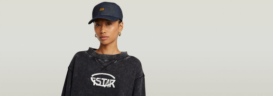 Überfärbter kurzer logo-pullover locker geschnitten