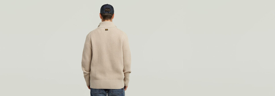 unverzichtbarer strickpullover mit halbem reißverschluss