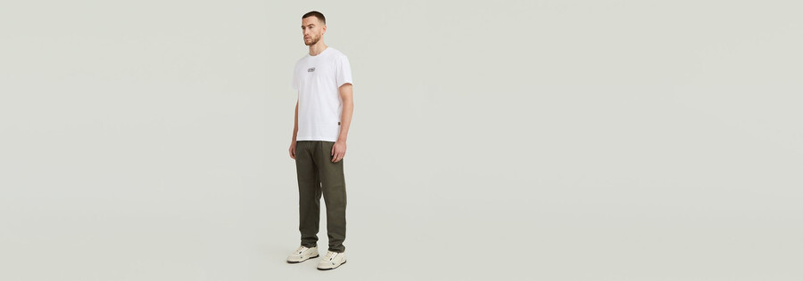 plissierte chino locker geschnitten schmal zulaufend