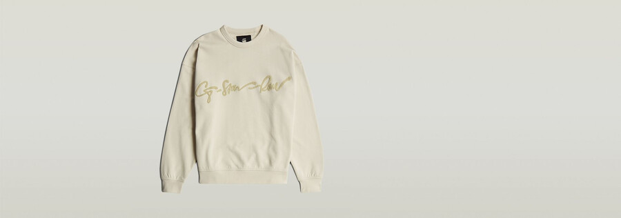 lockerer chenille-pullover mit g-schrift