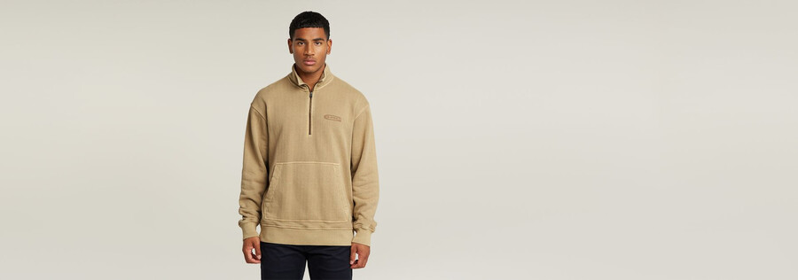 gewaschener lässiger pullover mit halbem reißverschluss