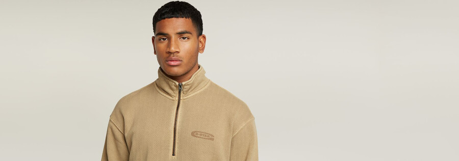 gewaschener lässiger pullover mit halbem reißverschluss
