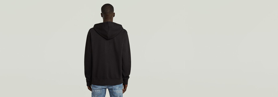 kapuzenpullover mit halbem reißverschluss und schriftzug