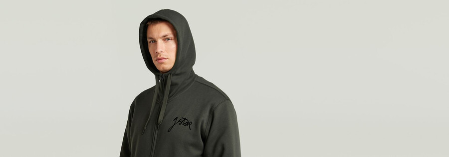 kapuzenpullover mit reißverschluss und schriftzug